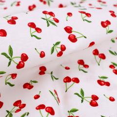 Tissu coton cretonne enduite motif fleurs CERISES Blanc